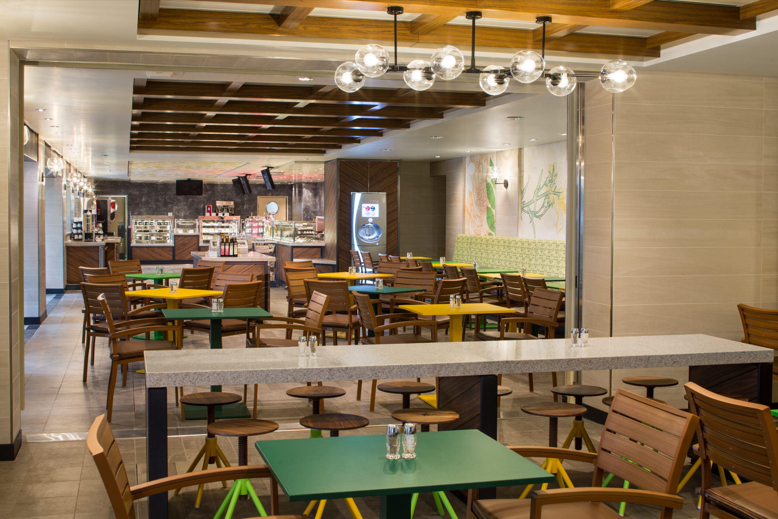 SY, Symphony of the Seas, Park Cafe - Deck 8 Midship Portside, restaurant interior, long table, tables, wooden chairs, casual dining, deli, decor,